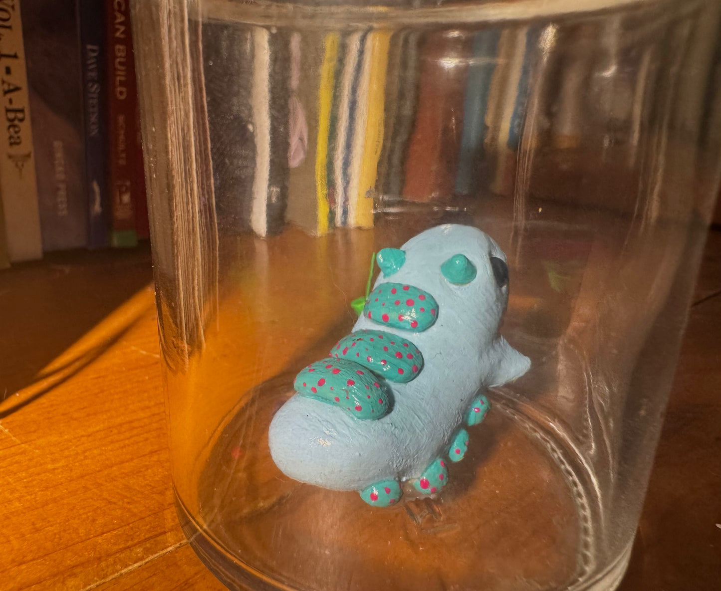 cutie blue creature in a jar