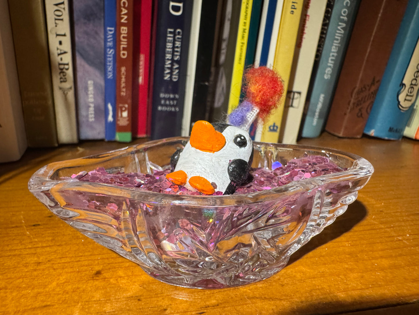 another party penguin in a confetti pool