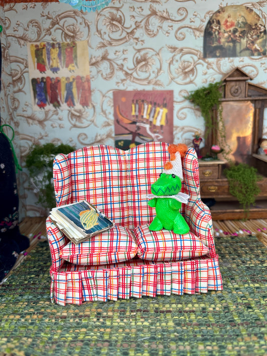 Gator on Checkered Couch