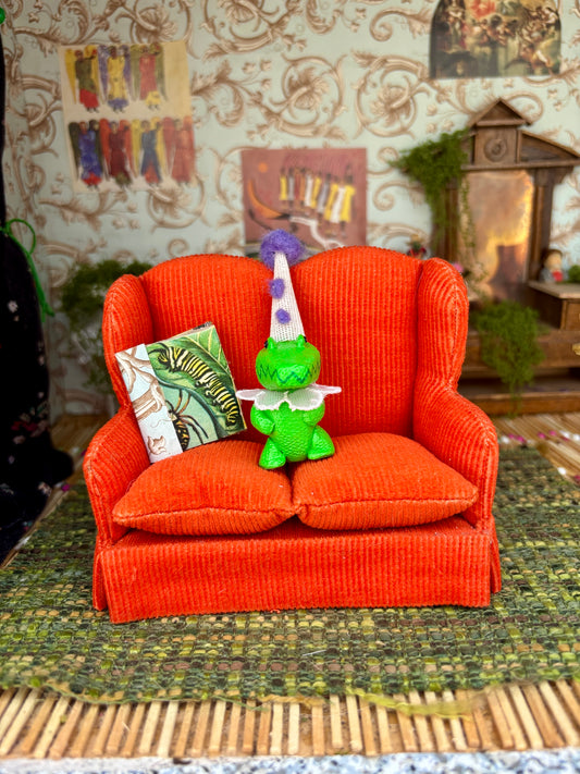 Gator on Orange Couch